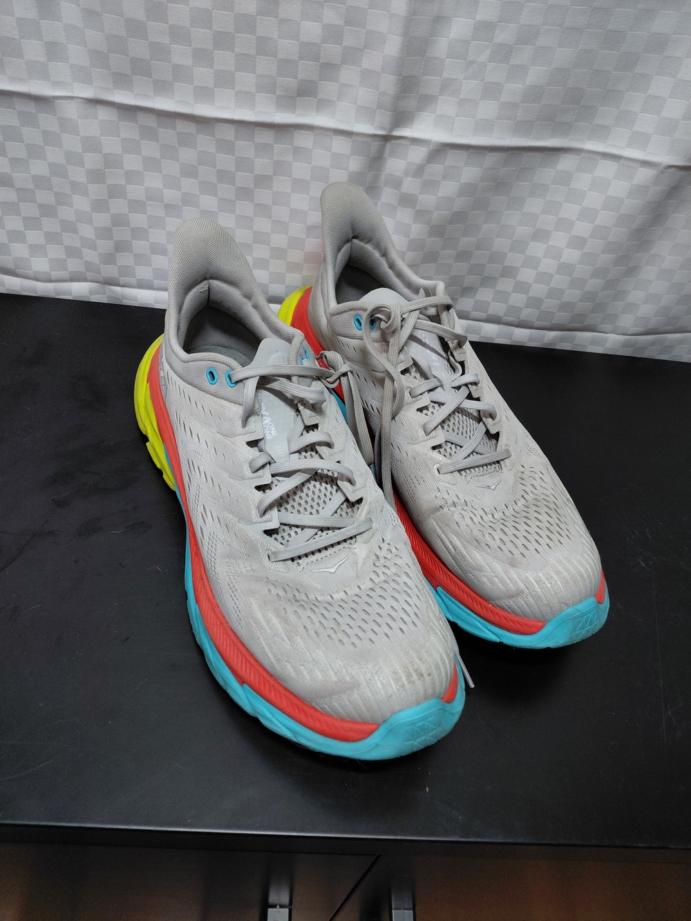 Hoka One One Gray Shoe Label with Blue Logo